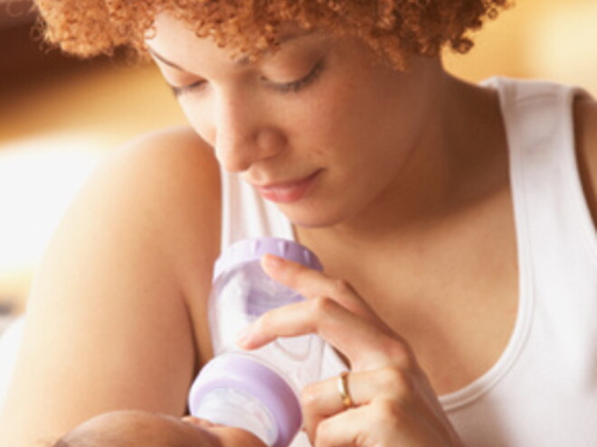 Mom feeding baby